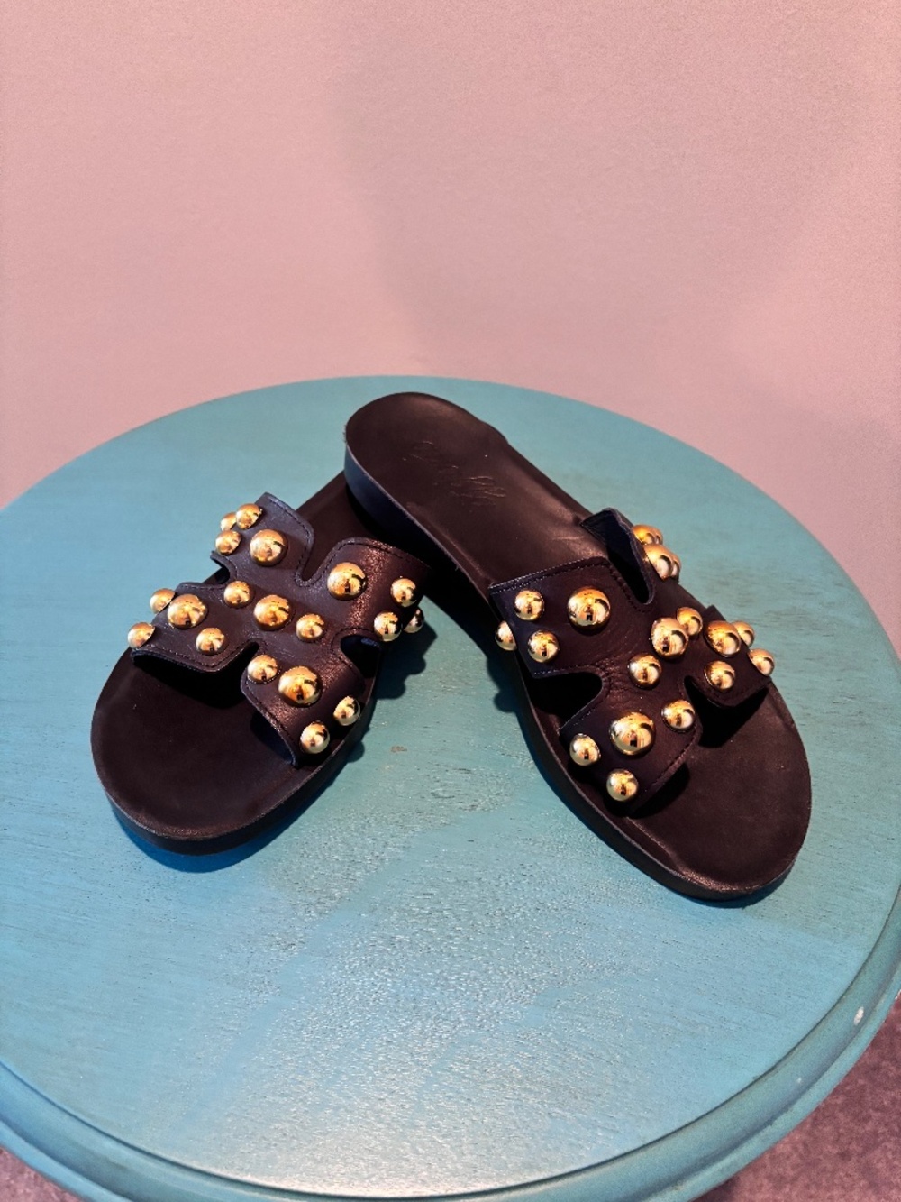 Antelope black and gold leather